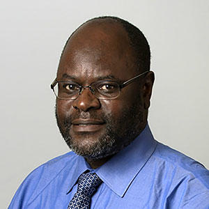 Headshot of Sam Mbulaiteye