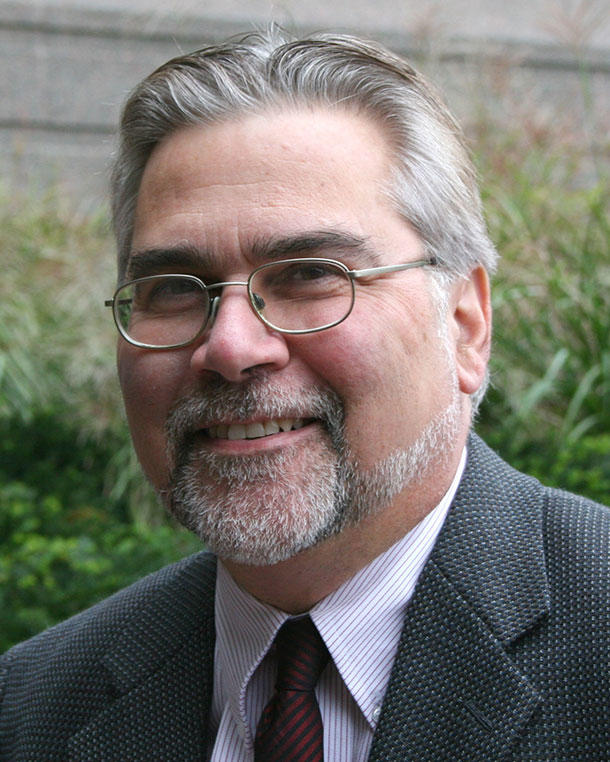 Headshot of Demetrius Albanes